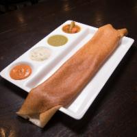 Masala Dosa · Savory crepe filled with mildly spiced mashed potatoes.