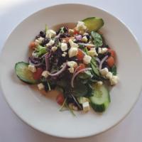 Greek Salad · Traditional Greek salad—always delicious. Romaine lettuce with our lemon-basil vinaigrette. ...