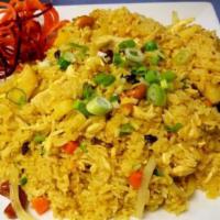 FR3. Thai Pineapple Fried Rice · Fried rice with yellow curry, egg, onion, raisin, pineapple, cashew, nut, peas, carrot and f...