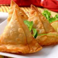 Samosa · A samosa is a South Asian fried or baked pastry with a savory filling like spiced potatoes, ...