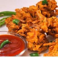 Mixed Veg Pakora · Mixed veg pakora are basically onion, cabbage, carrot, bell peppers, spinach... etc. fritter...