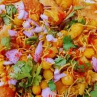 Samosa Chaat · Tangy, spicy, and crispy, samosa chaat is a delicious Indian street food where crispy Punjab...