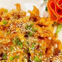 Sesame Chicken  · Chunks of marinated chicken sauteed with sesame in chef's honey sweet sauce.