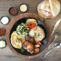 Dimassi's Grilled Chicken Plate · Served with rice, hummus, fattoush and pitabread.