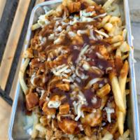 Mini Poutine · French fries topped with brown gravy, mozzarella cheese and shredded roasted chicken.