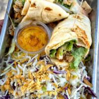 Curry Chicken Wrap · Curry chicken mix on naan bread. Served with house salad and sesame dressing.