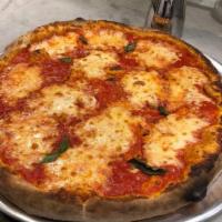 Napoletana Pizza · Classic wood fired New York style with whole milk mozzarella and our classic tomato-basil sa...