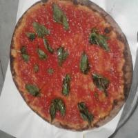 Marinara Pizza · Homemade marinara sauce with fresh garlic, basil, authentic Pecorino Romano and drizzled ext...