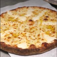 Bianca Pizza · Whole milk mozzarella topped with seasoned ricotta, authentic Pecorino Romano, drizzled with...
