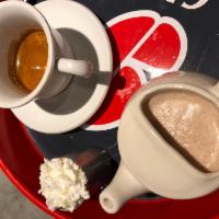 Hot Cocoa · Hot cocoa with steamed milk and fresh whipped cream. Can be served with a shot of fresh brew...