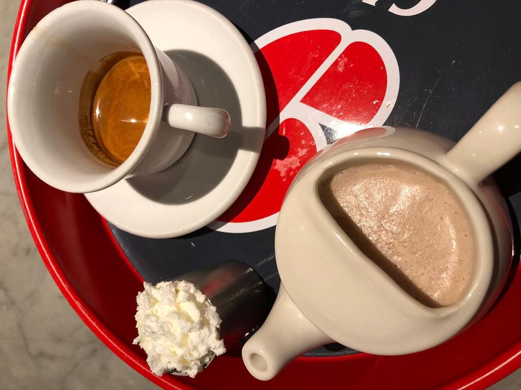 Hot Cocoa · Hot cocoa with steamed milk and fresh whipped cream. Can be served with a shot of fresh brewed espresso.