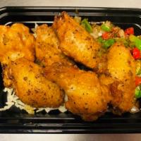 Salt and Pepper Chicken Wings · 6 pieces. Cooking times 20 minutes. Cooked wings of a chicken coated in sauce or seasoning. ...