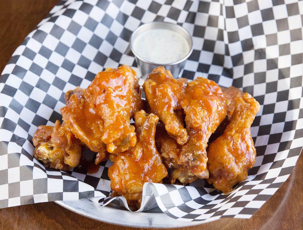 Finley's Crispy Wings · Crispy fried chicken wings tossed to order in your choice of sauce. Served with ranch or blue cheese.