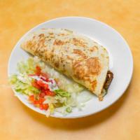 Fajita Quesadilla · Large flour tortilla filled with cheese and choice of seasoned steak or grill chicken, seare...