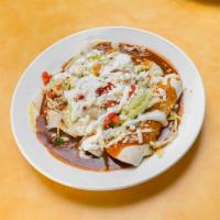 Enchiladas Supremas · A fine selection of 1 beef, 1 chicken, 1 cheese and 1 bean enchilada rolled in a golden corn...