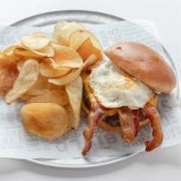 Bacon, Egg and Cheese Burger · Two strips of bacon, cheddar cheese, an over-easy fried egg and mayo.