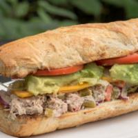Tuna Avocado Sandwich · Tuna and cheddar cheese topped with onions, spicy giardiniera peppers and homemade cream sau...