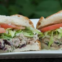 Cranberry Tuna Salad Sandwich · Tuna with mayonnaise, parsley, lettuce, tomato and cranberries on your choice of bread.
