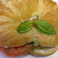 Goat Cheese Basil Sandwich · Goat cheese, basil, tomato and olive oil on a croissant.