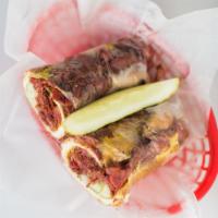 Pastrami Sandwich · 1/2 lb. of grilled pastrami with mustard, chopped pickle, and served on a French roll with a...