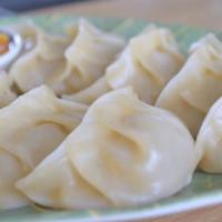 Momo Vegetable · Steamed dumpling served with tomato chutneys.