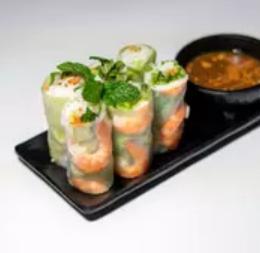 Shrimp Spring Rolls  · Poached shrimp, vermicelli noodles, lettuce, cucumber, pickled carrots, pickled daikon, freshly wrapped with rice paper. Served with a peanut hoisin sauce.