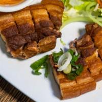 Crispy Pork Belly  · Served with sweet soy sauce.