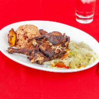 Jerk Chicken Entrée · Signature dish. 1/2 bone-in chicken, dry rubbed with Jamaican jerk herbs & spices, marinated...