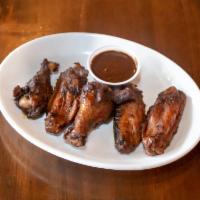 Jerk Wing Entrée  · Wings, dry rubbed with Jamaican jerk herbs & spices, marinated, then finished on a charbroil...