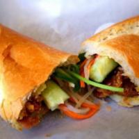 Vietnamese Grilled Pork Patties & Spring Roll Sandwich (Bánh mì nem nướng & chả giò) · Served with mayo, pate, cucumber, daikon and carrot pickles, cilantro, house special dressin...