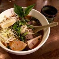 Combo HUE-STYLE SPICY BEEF & PORK NOODLE SOUP with Soda (Combo Bún Bò Huế + lon soda) · ($1 in saving)
The broth contains shrimp paste!
Spicy lemongrass beef broth and rice noodle ...