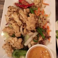 Deep Fried Crispy Calamari (Mực chiên dòn) · Served with House Special Sweet and Sour Dipping Sauce.