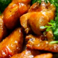 Fried Chicken Wings with Tamarind sauce (Cánh gà chiên me) · 5 pieces.
Served with French Fries. 