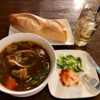 Vietnamese Braised Beef Stew (Bánh mì bò kho) · Beef stew with carrots and potatoes.
Served with Baguette.