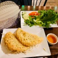 Vietnamese Shrimp Pancakes (Bánh Xèo) · 2 Pancakes.
A traditional mixture of shrimp and bean sprouts, enclosed in a rice flour crepe...