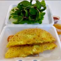 Vietnamese Seafood Pancakes (Bánh Xèo Đồ Biển) · 2 Pancakes.
A traditional mixture of shrimp, Crab meat, Squid and bean sprouts, enclosed in ...