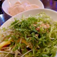 Refreshing Green Papaya and Mango Salad (Gỏi Xoài Đu Đủ không) · Served with green papaya, mango, shredded lettuce, Vietnamese coriander, daikon & carrot pic...