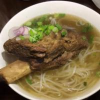 Special Signature Short Rib Beef Noodle Soup (Phở sườn bò) · Beef broth and rice noodle. Topped with scallion, onion, cilantro and side dishes of bean sp...