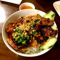 Grilled Chicken over Rice vermicelli (Bún gà nướng) · Mild spicy BBQ dark meat chicken.
Served with shredded lettuce, cucumber, pickles daikon and...