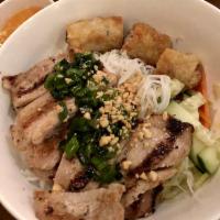 Grilled Sliced Pork with Taro & Veggie Spring Roll over Rice Vermicelli (Bún chả giò chay, thịt nướng) · Served with shredded lettuce, cucumber, pickles daikon and carrot, scallion oil garnish, cru...