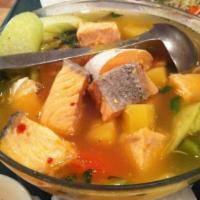 Vietnamese Hot and Sour Soup with Salmon (Canh chua cá) · With Okra, Pineapple, Bean sprouts, Tomato, Taro Stem in Tamarind, Chicken broth and topped ...