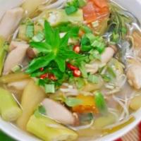 Vietnamese Hot and Sour Soup with Chicken (Canh chua gà) · White meat chicken with Okra, Pineapple, Bean sprouts, Tomato, Taro Stem in Tamarind, Chicke...