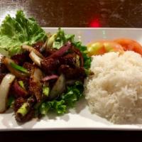 Sauteed Marinated Flank Steak Cubes over White rice (Cơm Bò Lúc Lắc) · *Recommend with fried rice.