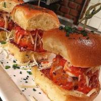 Meatball Sliders · Veal, beef and pork meatballs, roasted tomato sauce and mozzarella.