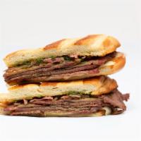 Steak Sandwich · The Lucy. Smoked tri-rip, swiss, pickled red onions, chimichurri on a pressed roll.