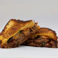 Pulled Pork Grilled Cheese · The Jeff. Carolina style pork, jalapenos, pickled red onions, BBQ sauce, cheddar, pepper jac...