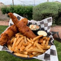 Fish and Chips · Beer battered white fish served with coleslaw, tartar sauce and lemon.