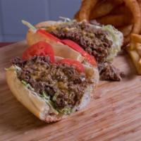 Cheese Steak Hoagie · Served with lettuce, tomato, your onion choice and mayo huge premium beef or chicken on an a...
