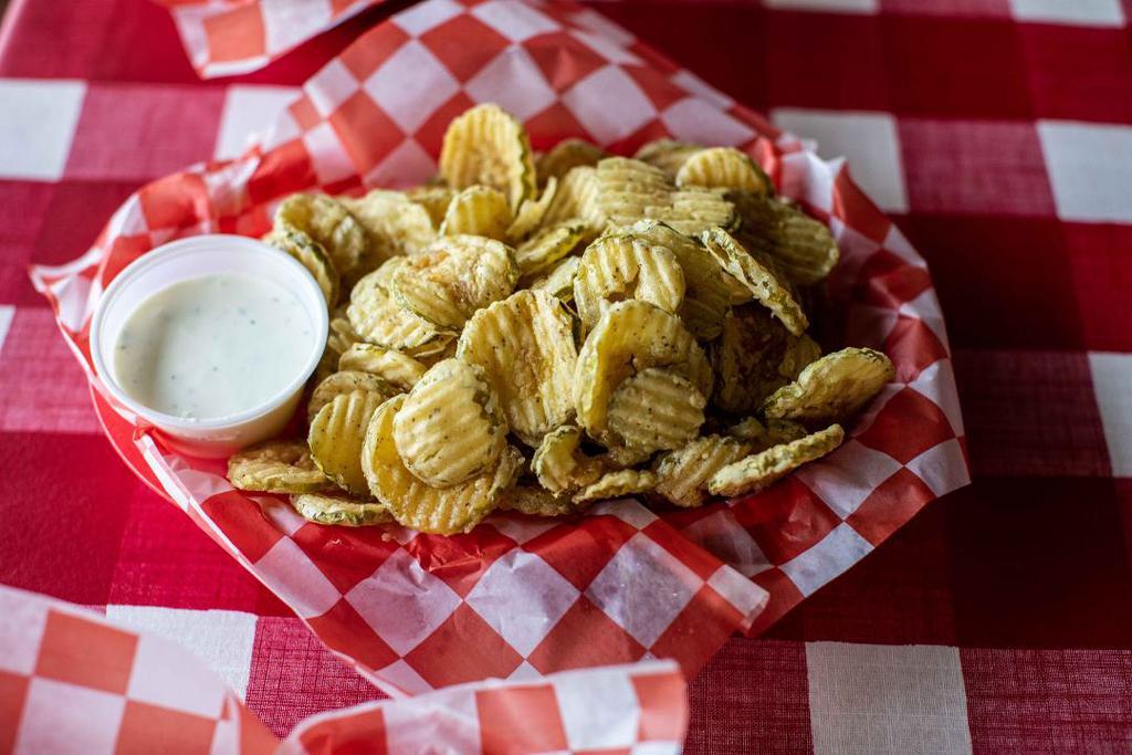 Fried Pickles · Hand breaded chips served with Ranch dressing