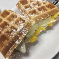 Maple Sausage Waffle Sandwich · Waffle toast breakfast sandwich filled with maple sausage, 2 fried eggs, American cheese and...